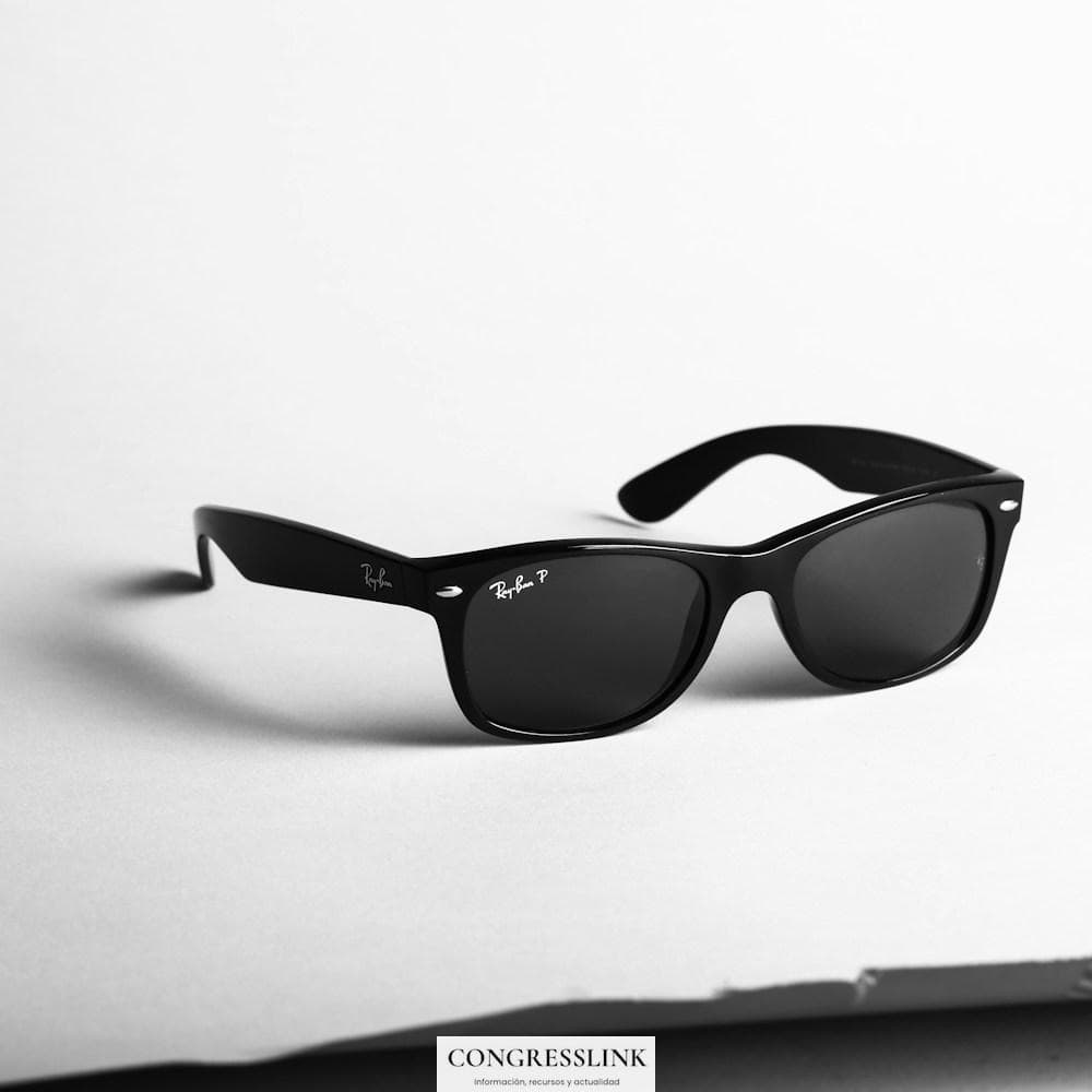 shallow focus photo of black Ray-Ban wayfarer sunglasses
